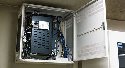 PoE swith and other equipment are installed in the enclosure box